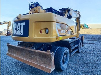 Багер на тркала CATERPILLAR M318D MH