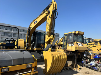 Багер на тркала CATERPILLAR M318: слика 3
