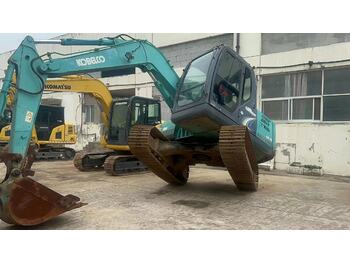 Мини багер KOBELCO