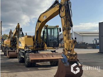 Багер на тркала Caterpillar M313D: слика 4