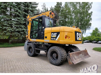 Багер на тркала Caterpillar M313D: слика 2