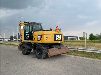 Багер на тркала CATERPILLAR M313D