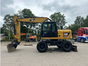 Багер на тркала CATERPILLAR M313D