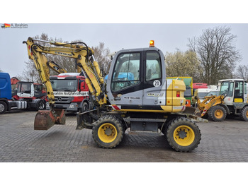 Багер на тркала NEW HOLLAND