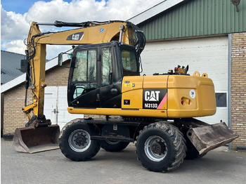 Багер на тркала Caterpillar M313D: слика 4
