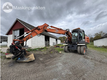 Багер на тркала HITACHI ZX140W-3