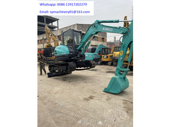 Мини багер KOBELCO