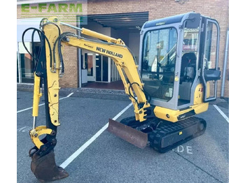 Мини багер NEW HOLLAND