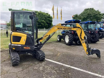 Мини багер NEW HOLLAND