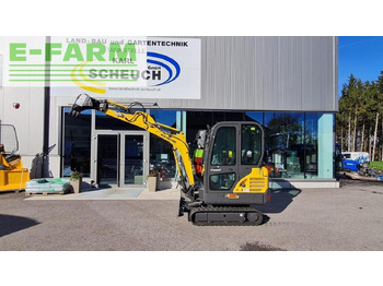 Мини багер NEW HOLLAND