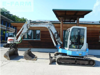 Мини багер TAKEUCHI