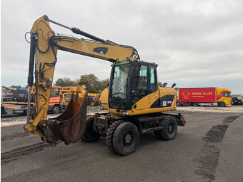 Багер на тркала CATERPILLAR M313D