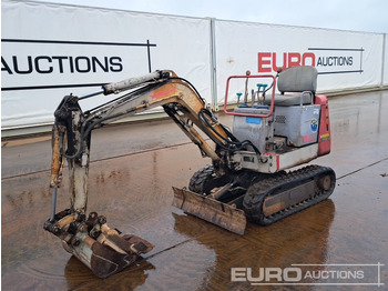 Мини багер TAKEUCHI