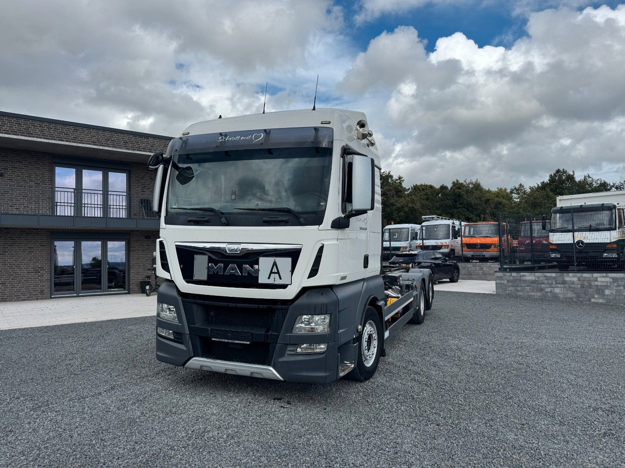 MAN TGX 26.520 D38 Abrollkipper Multilift - Камион со кука за подигање: слика 3 MAN TGX 26.520 D38 Abrollkipper Multilift - Камион со кука за подигање: слика 3