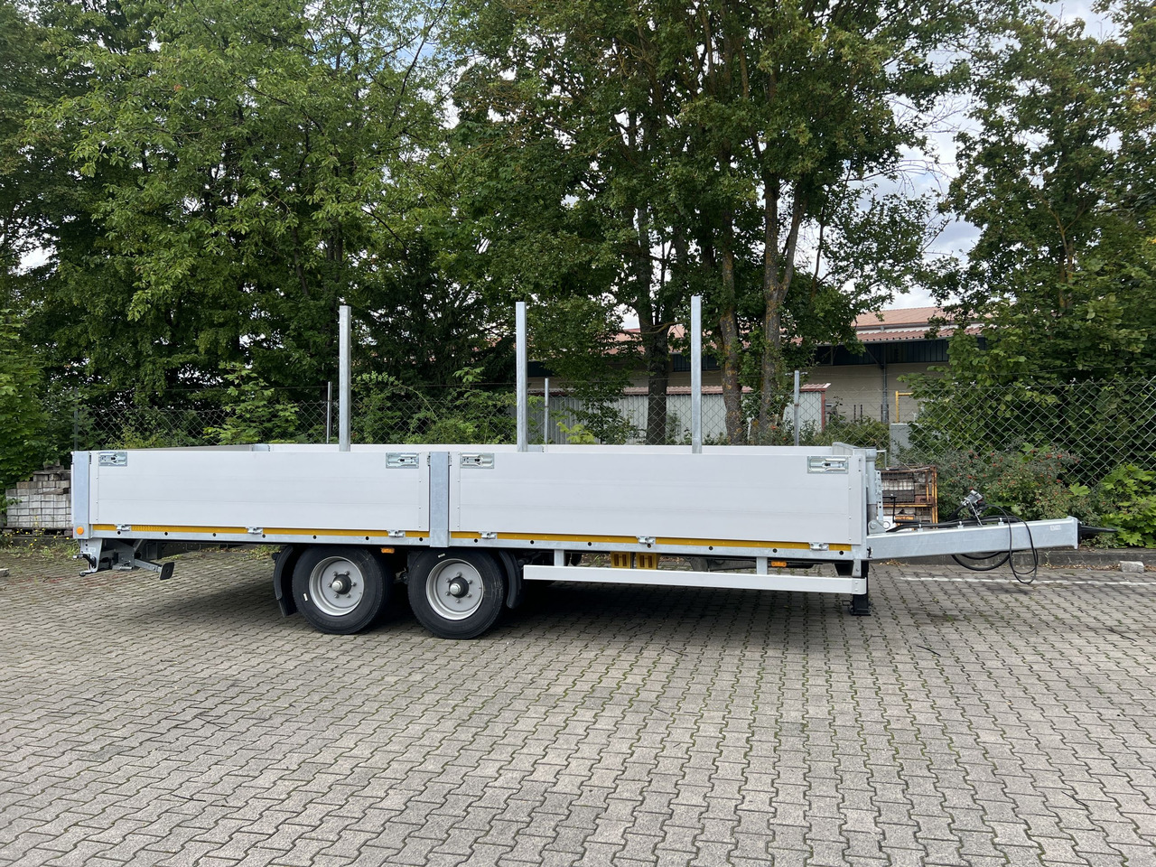 Möslein THT 11- G 6,2 Tandem Pritsche- Tieflader mit Rungentaschen - Приколка платформа: слика 1 Möslein THT 11- G 6,2 Tandem Pritsche- Tieflader mit Rungentaschen - Приколка платформа: слика 1
