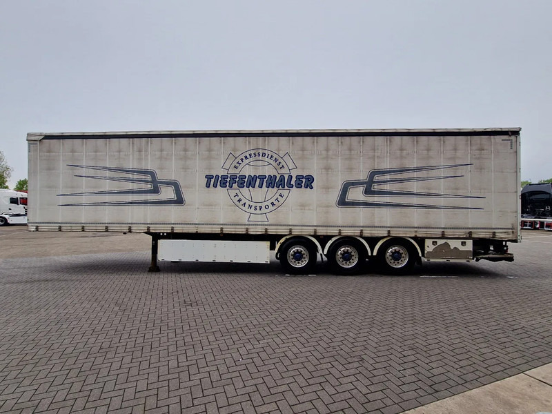 Schwarzmüller Tautliner 3 axle - Loadlift - Lift axle - BPW Axle - Lift axle - Alloy wheels - Полуприколка со церада: слика 4 Schwarzmüller Tautliner 3 axle - Loadlift - Lift axle - BPW Axle - Lift axle - Alloy wheels - Полуприколка со церада: слика 4