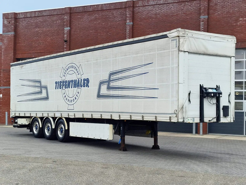 Schwarzmüller Tautliner 3 axle - Loadlift - Lift axle - BPW Axle - Lift axle - Alloy wheels - Полуприколка со церада: слика 1 Schwarzmüller Tautliner 3 axle - Loadlift - Lift axle - BPW Axle - Lift axle - Alloy wheels - Полуприколка со церада: слика 1