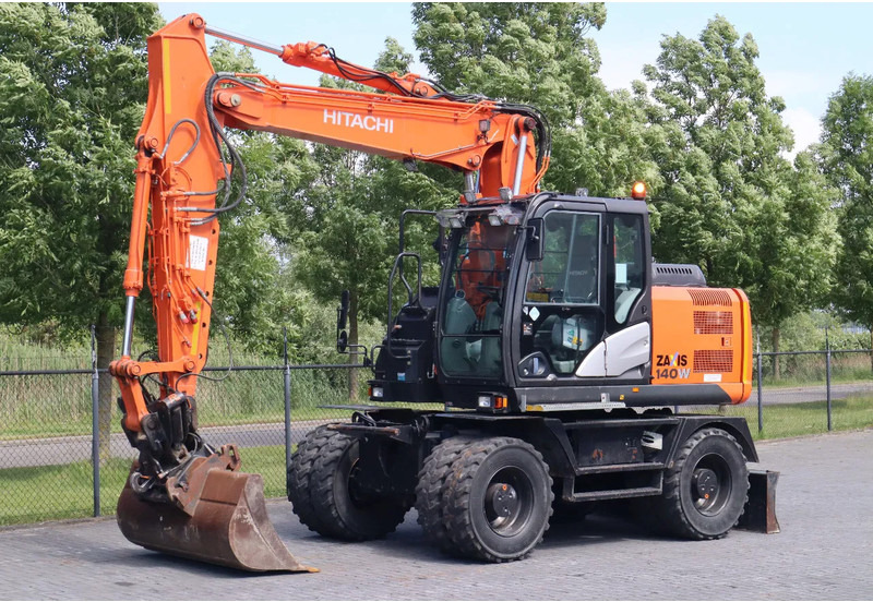 Hitachi ZX 140 W-5B | TILT QC | BUCKET | DOZER BLADE | DUTCH REG. - Багер на тркала: слика 2 Hitachi ZX 140 W-5B | TILT QC | BUCKET | DOZER BLADE | DUTCH REG. - Багер на тркала: слика 2