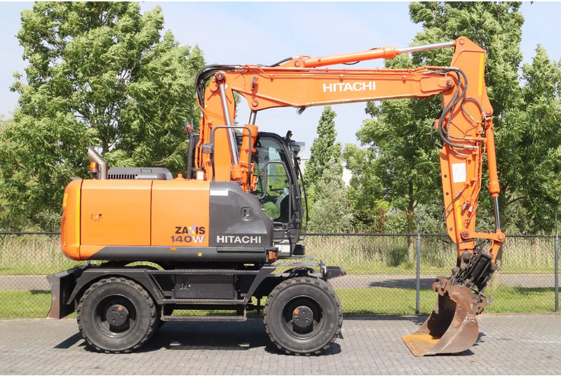 Hitachi ZX 140 W-5B | TILT QC | BUCKET | DOZER BLADE | DUTCH REG. - Багер на тркала: слика 4 Hitachi ZX 140 W-5B | TILT QC | BUCKET | DOZER BLADE | DUTCH REG. - Багер на тркала: слика 4