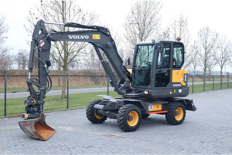 Volvo EW60E | DEMO | 30 KM/H | ROTOTILT + GRIPPER | BUCKET - Багер на тркала: слика 2 Volvo EW60E | DEMO | 30 KM/H | ROTOTILT + GRIPPER | BUCKET - Багер на тркала: слика 2