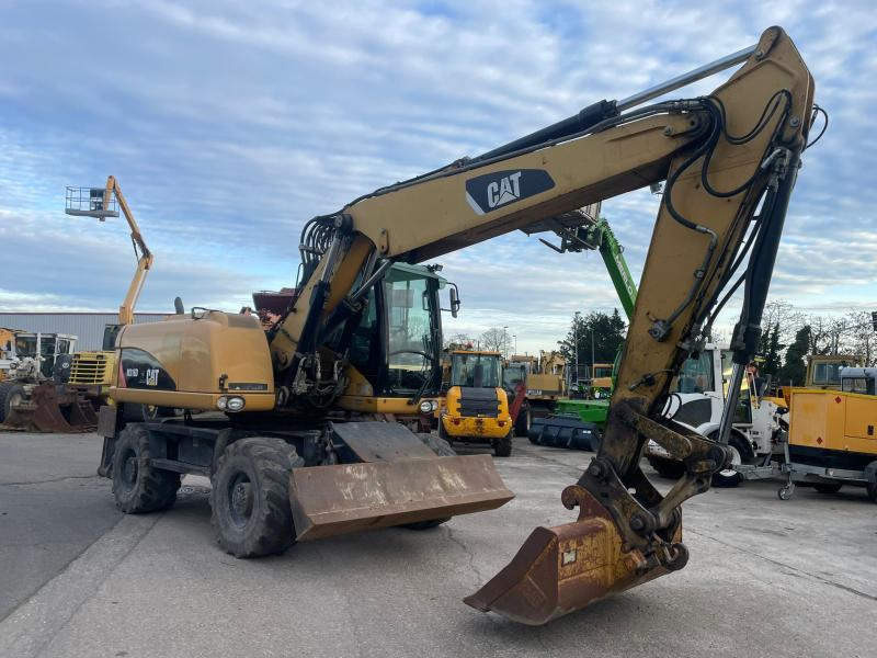 Caterpillar M316 - Багер на тркала: слика 2 Caterpillar M316 - Багер на тркала: слика 2