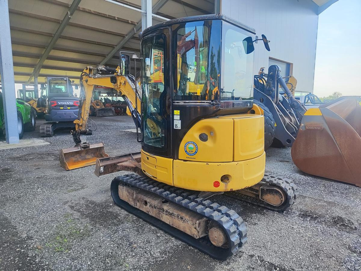 Caterpillar 303.5 - Мини багер: слика 1 Caterpillar 303.5 - Мини багер: слика 1