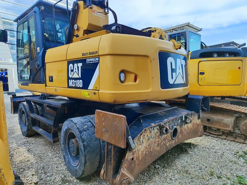 Caterpillar M318D MH - Багер на тркала: слика 1 Caterpillar M318D MH - Багер на тркала: слика 1