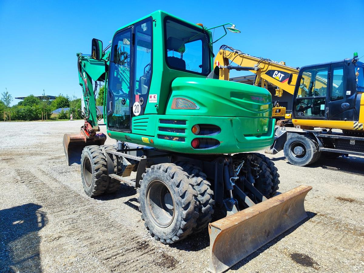 Takeuchi TB295W - Багер на тркала: слика 1 Takeuchi TB295W - Багер на тркала: слика 1