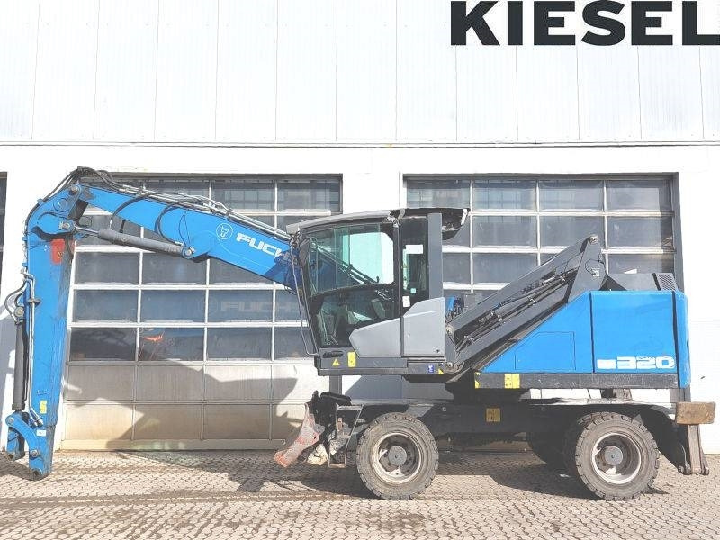 Fuchs MHL 320 F - Справувач со отпад/ Индустрија: слика 1 Fuchs MHL 320 F - Справувач со отпад/ Индустрија: слика 1