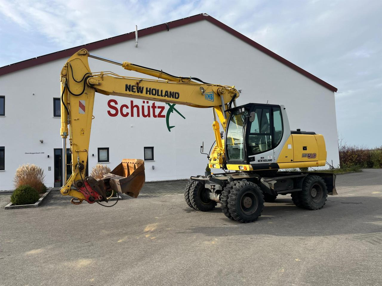 New Holland MH 5.6 inkl. Grabenlöffel, Tieflöffel - Багер на тркала: слика 2 New Holland MH 5.6 inkl. Grabenlöffel, Tieflöffel - Багер на тркала: слика 2