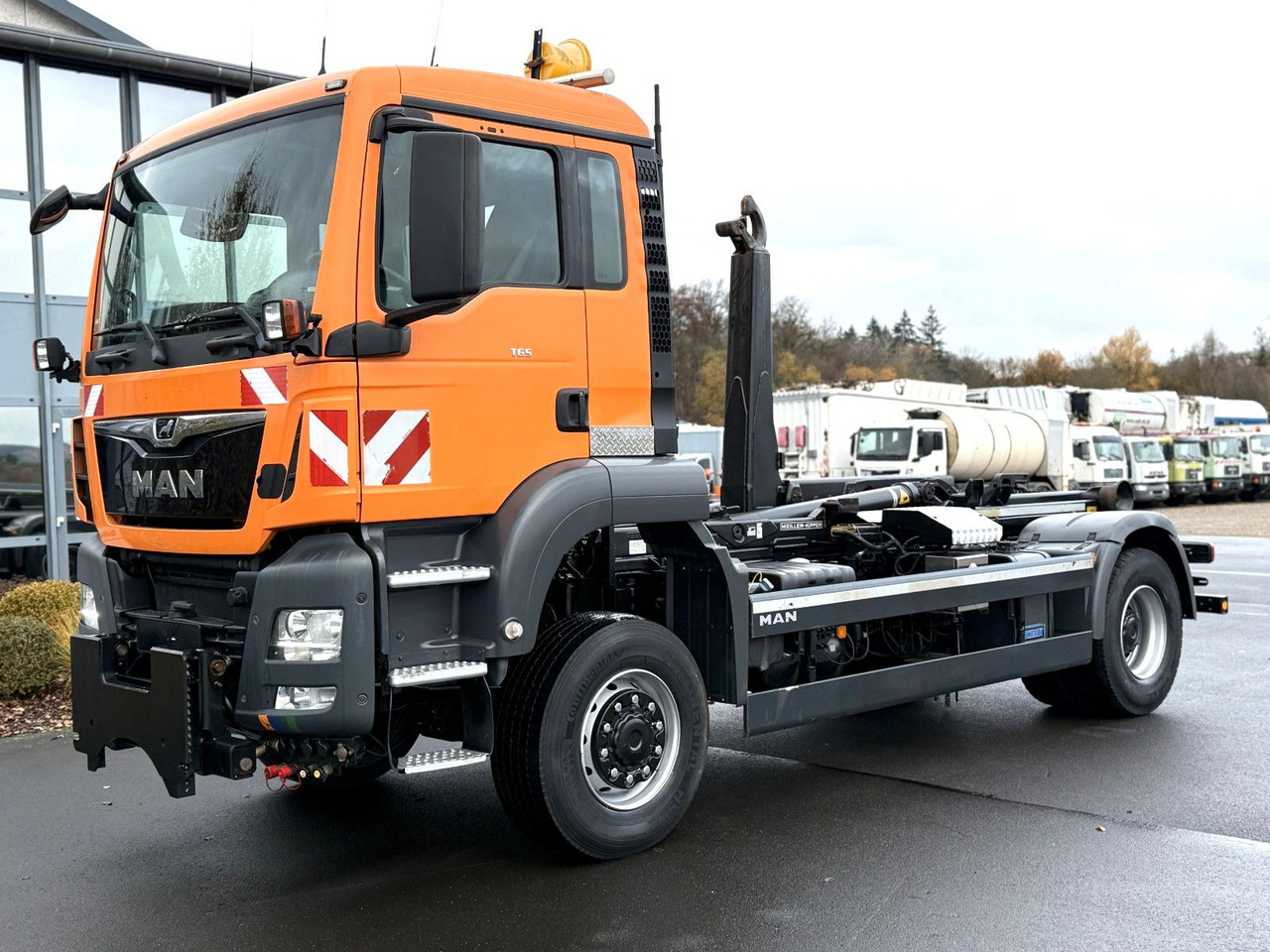 MAN TGS 18.360 4x4 Winterdienst Meiller Abroller - Камион со кука за подигање: слика 1 MAN TGS 18.360 4x4 Winterdienst Meiller Abroller - Камион со кука за подигање: слика 1