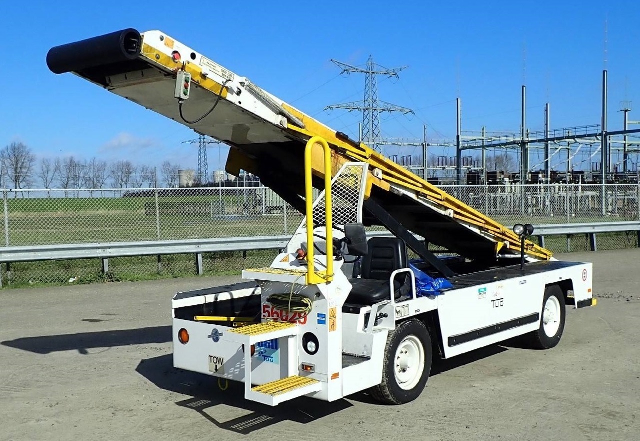 STEWART STEVENSON TUG Beltloader TUG 660-144 - Транспортна лента за авиони: слика 1 STEWART STEVENSON TUG Beltloader TUG 660-144 - Транспортна лента за авиони: слика 1