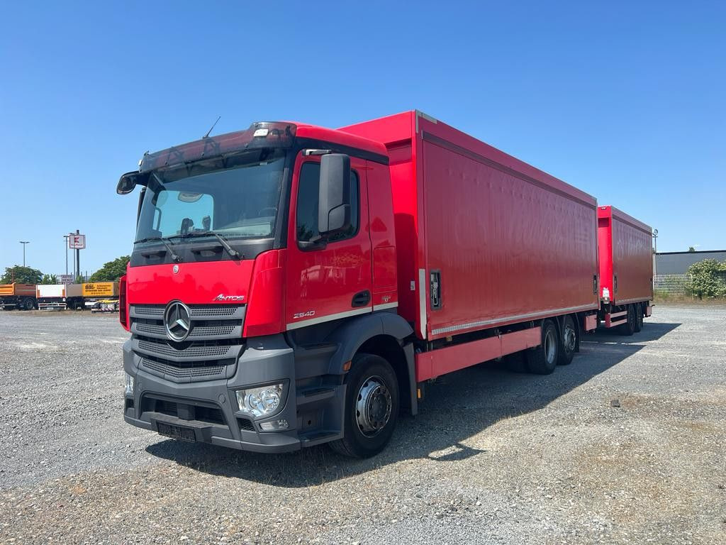 Mercedes-Benz Antos 2540 L 6x2 Pritsche LBW Mercedes-Benz Antos 2540 L 6x2 Pritsche LBW Coca Cola Getränke - Камион со церада: слика 1 Mercedes-Benz Antos 2540 L 6x2 Pritsche LBW Mercedes-Benz Antos 2540 L 6x2 Pritsche LBW Coca Cola Getränke - Камион со церада: слика 1