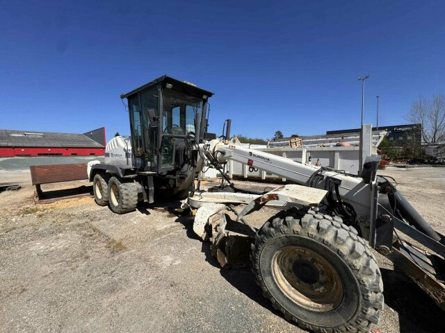 New Holland F106.6A alrrad 6x6 Grader 12 Ton - 10.700 Std - Порамнувач: слика 1 New Holland F106.6A alrrad 6x6 Grader 12 Ton - 10.700 Std - Порамнувач: слика 1