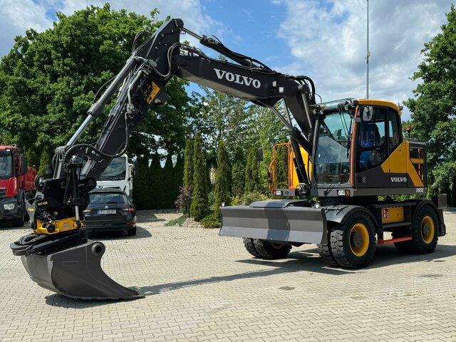 Volvo EWR150E Mobilbagger mit ROTATOR ENCONG EC319 - Багер на тркала: слика 1 Volvo EWR150E Mobilbagger mit ROTATOR ENCONG EC319 - Багер на тркала: слика 1