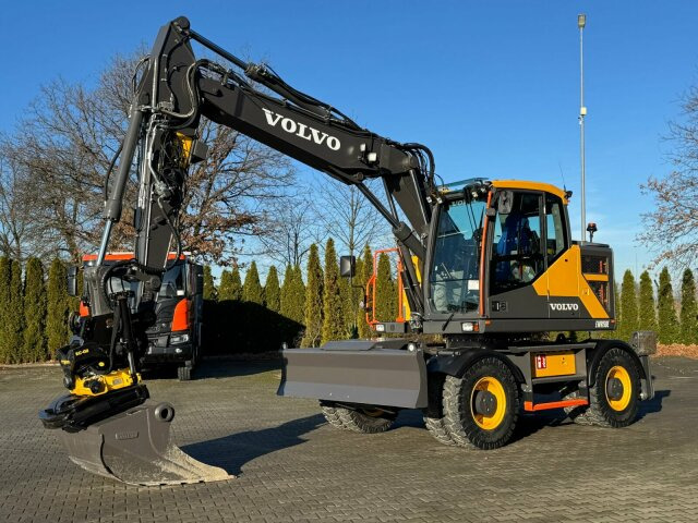 Volvo EWR150E Mobilbagger mit ROTATOR ENCONG EC319 - Багер на тркала: слика 1 Volvo EWR150E Mobilbagger mit ROTATOR ENCONG EC319 - Багер на тркала: слика 1