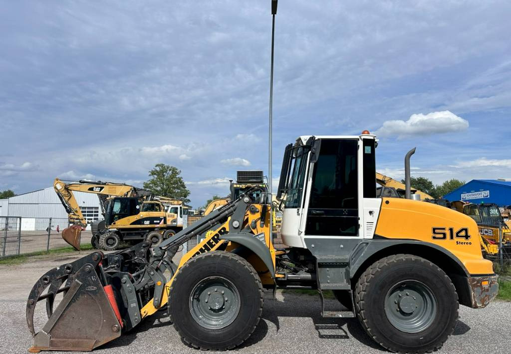 Liebherr L 514 Stereo +30 Kmh Klima 3er Kreis Greifschaufel - Натоварувач на тркала: слика 1 Liebherr L 514 Stereo +30 Kmh Klima 3er Kreis Greifschaufel - Натоварувач на тркала: слика 1