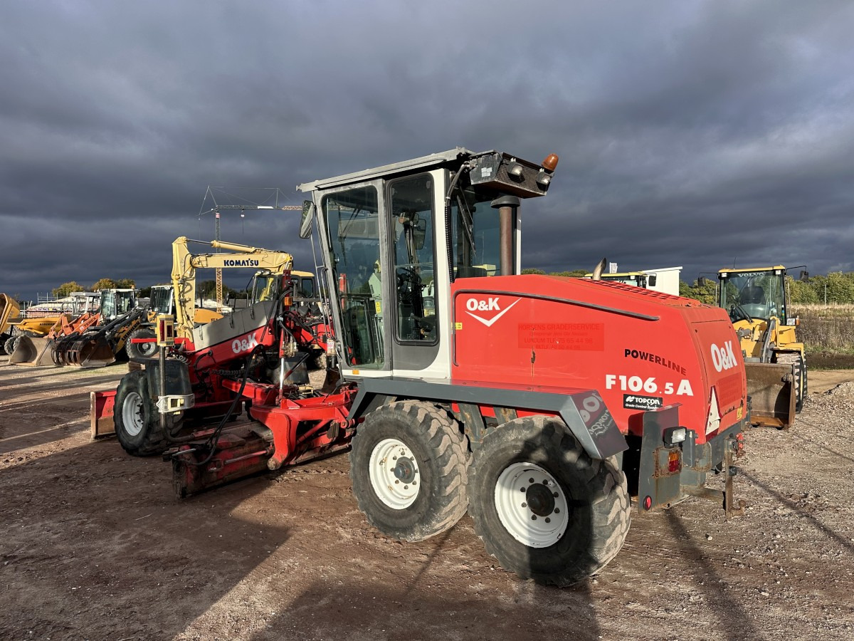 O&K F 106.5 - 6x6 Laser Topcon- Klima Cummins 6 Zyl. - Порамнувач: слика 5 O&K F 106.5 - 6x6 Laser Topcon- Klima Cummins 6 Zyl. - Порамнувач: слика 5