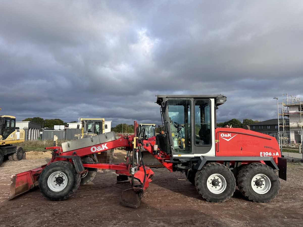 O&K F 106.5 - 6x6 Laser Topcon- Klima Cummins 6 Zyl. - Порамнувач: слика 1 O&K F 106.5 - 6x6 Laser Topcon- Klima Cummins 6 Zyl. - Порамнувач: слика 1