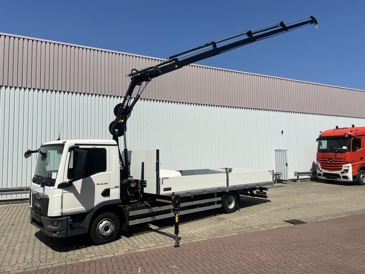 MAN TGL 12.190 4x2 BL TGL 12.190 4x2 BL mit Kran Hiab Hiduo 072DS-4 - Камион со кран: слика 1 MAN TGL 12.190 4x2 BL TGL 12.190 4x2 BL mit Kran Hiab Hiduo 072DS-4 - Камион со кран: слика 1
