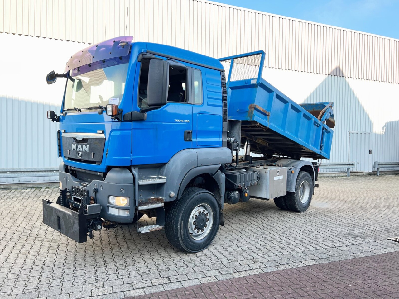 MAN TGS 18.360 4X4 BL TGS 18.360 4X4 BL, Hinterkipper, hydr. Heckklappe, Winterdienstausstattung - Кипер: слика 1 MAN TGS 18.360 4X4 BL TGS 18.360 4X4 BL, Hinterkipper, hydr. Heckklappe, Winterdienstausstattung - Кипер: слика 1