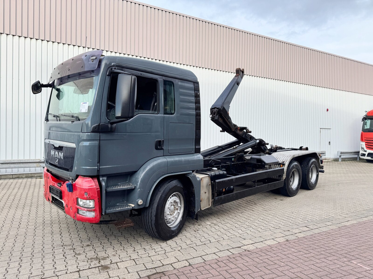 MAN TGS 26.440 6x4 BB TGS 26.440 6x4 BB, Meiller Schub-Knick - Камион со кука за подигање: слика 1 MAN TGS 26.440 6x4 BB TGS 26.440 6x4 BB, Meiller Schub-Knick - Камион со кука за подигање: слика 1