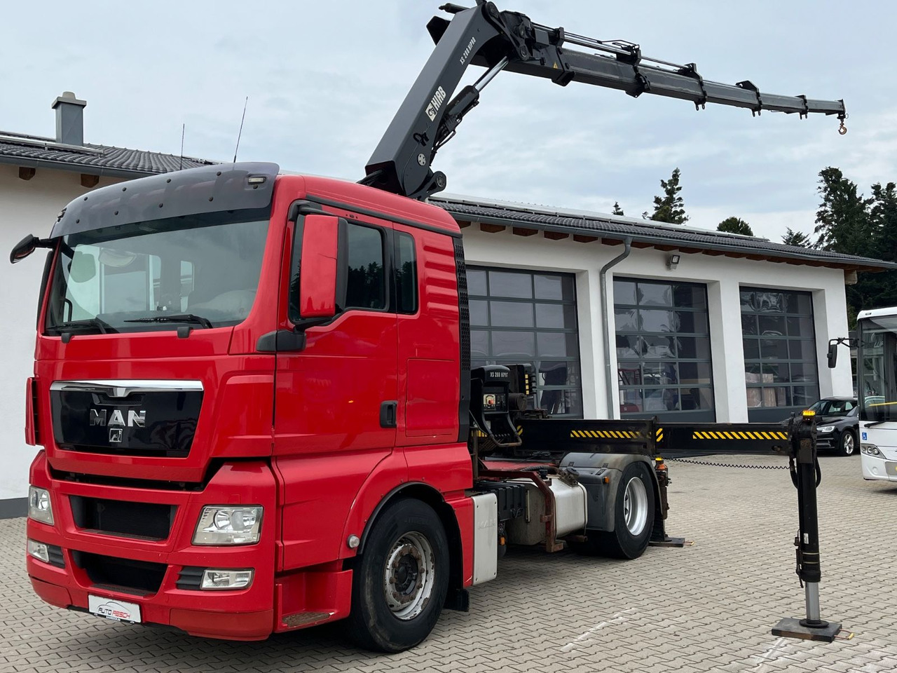 MAN TGX 18.400 mit Kran HIAB 288E P-5 HIPRO - Камион влекач: слика 1 MAN TGX 18.400 mit Kran HIAB 288E P-5 HIPRO - Камион влекач: слика 1