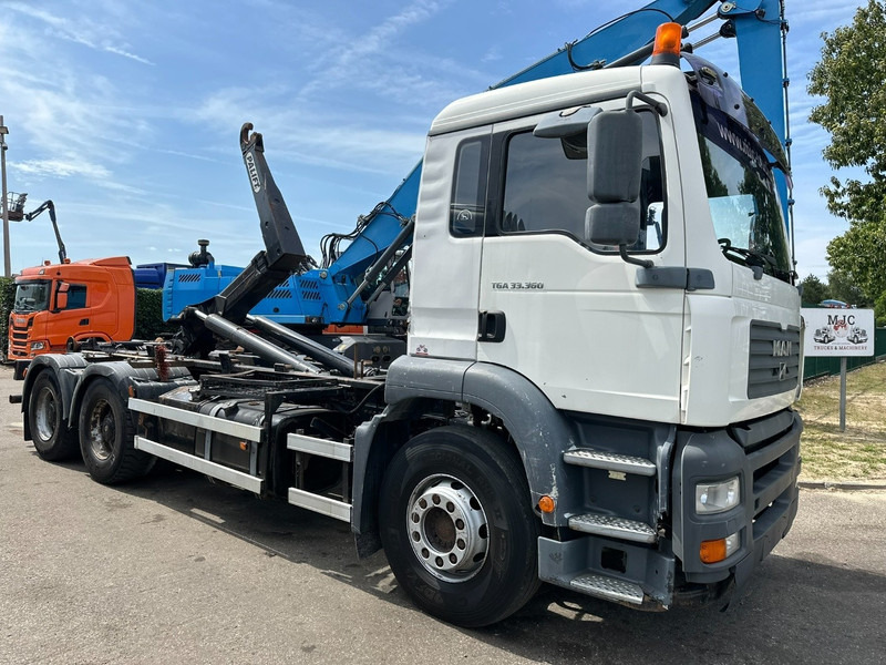 MAN TGA 33.360 6x4 HOOKLIFT - MANUAL ZF - BIG AXLES HUB REDUCTION / STEEL SPRING - BE TRUCK - Камион со кука за подигање: слика 1 MAN TGA 33.360 6x4 HOOKLIFT - MANUAL ZF - BIG AXLES HUB REDUCTION / STEEL SPRING - BE TRUCK - Камион со кука за подигање: слика 1