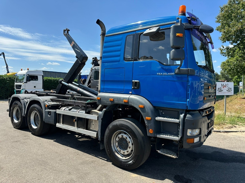 MAN TGA 33.400 6X4 HOOKLIFT AJK NHS20-4930mm - WB 3m60 - MANUAL ZF - STEEL SPRING / BLATT - BIG AXLES / AP ACHSEN - Камион со кука за подигање: слика 1 MAN TGA 33.400 6X4 HOOKLIFT AJK NHS20-4930mm - WB 3m60 - MANUAL ZF - STEEL SPRING / BLATT - BIG AXLES / AP ACHSEN - Камион со кука за подигање: слика 1