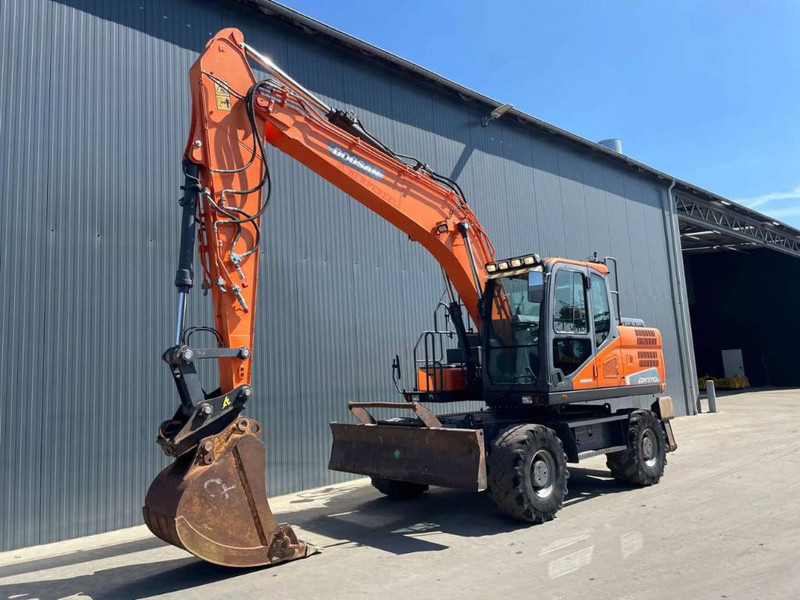 Doosan DX170W-5 - Багер на тркала: слика 1 Doosan DX170W-5 - Багер на тркала: слика 1