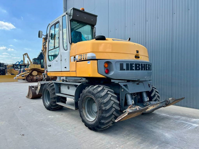 Liebherr A311 Litronic - Багер на тркала: слика 2 Liebherr A311 Litronic - Багер на тркала: слика 2