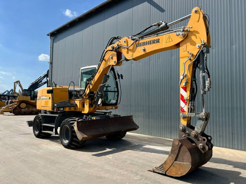 Liebherr A311 Litronic - Багер на тркала: слика 3 Liebherr A311 Litronic - Багер на тркала: слика 3