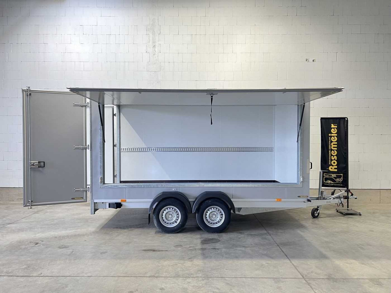 VEZEKO TK D 27.40 Flügeltüren+Seitenk Kofferanhänger Promotionanhänger - Приколка сандучар: слика 1 VEZEKO TK D 27.40 Flügeltüren+Seitenk Kofferanhänger Promotionanhänger - Приколка сандучар: слика 1