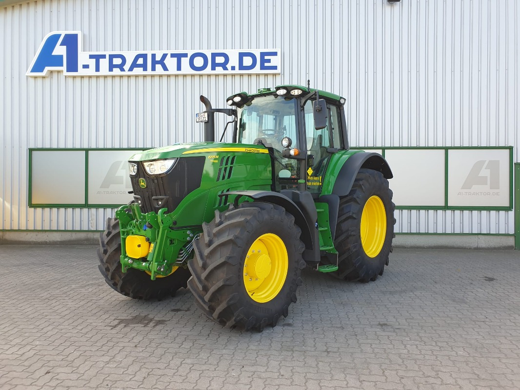 John Deere 6195M **MIETRÜCKLÄUFER** - Трактор: слика 1 John Deere 6195M **MIETRÜCKLÄUFER** - Трактор: слика 1